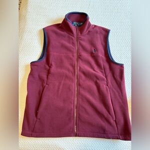 Polo vest size M rust colored with blue trim. Fleece material full zipper.